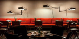 Chapeau Chinois I, a swing-arm wall lamp by Janette Laverrière at Duddell's, Hong Kong, available at JL Editions 