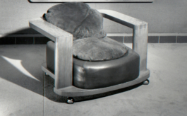 Historic photograph of Fauteuil Cognac, an upholstered armchair by Janette Laverrière, available via JL Editions 